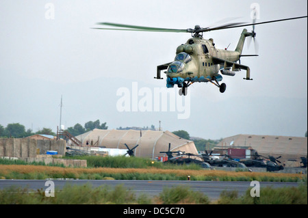 An Afghan air force Mi-35 attack helicopter departs on a mission July 23, 2013 at Jalalabad Airfield, Afghanistan.