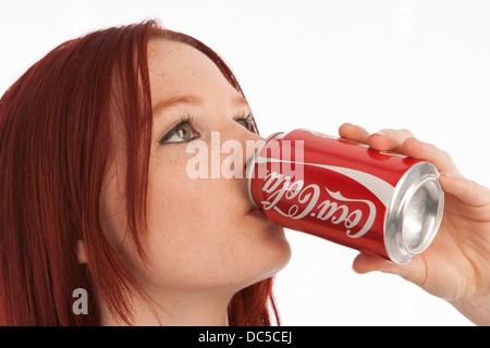 A girl with a coke-cola can. Stock Photo