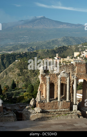 Greco-Roman ruins with Mt. Etna as a backdrop in Taormina Sicily Stock Photo