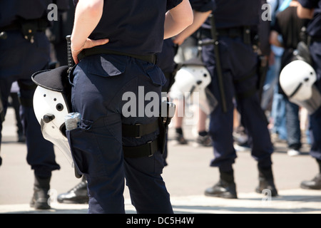 police officers with gear on duty Stock Photo