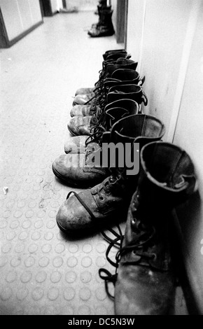 British Army soldiers boots outside sleeping quarters at Dungannon Barracks in County Tyrone Northern Ireland 1993 Stock Photo