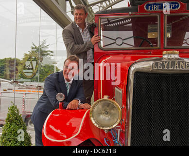 Leyland, Lancashire, UK 8th August 2013. Last surviving 1938 Leyland TL Fire Engine, named Norma, unveiled for the first time in its new purpose built glass case as part of the Leyland Gateway Project in front of invited guests. © Sue Burton/Alamy News Stock Photo