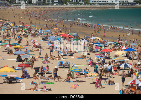 SUNBATHERS SARDINERO BEACH SANTANDER CANTABRIA SPAIN Stock Photo