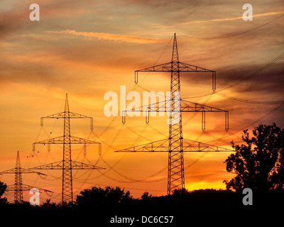 Power lines towers seen in the Spanish island of Mallorca. Stock Photo