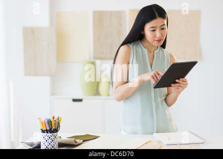 Business woman using tablet pc Stock Photo