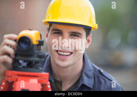 Engineer using theodolite Stock Photo