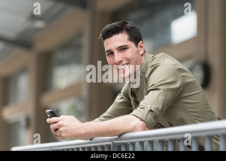Man text messaging Stock Photo