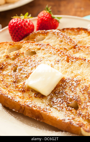 Homemade French Toast with Butter and Powdered Sugar Stock Photo
