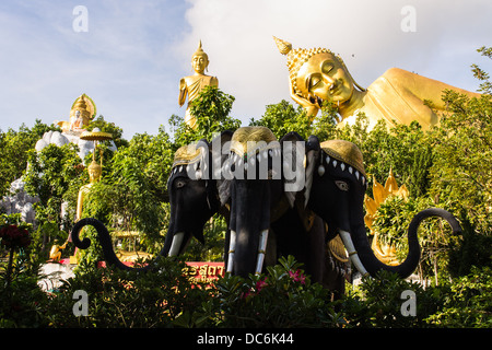 Erawan statue ,Big Reclining Buddha And Standing buddha in Wat Mokkanlan , Chomthong Chiangmai Thailand Stock Photo