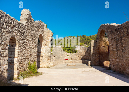 Ruins of early Christian basilica from the 5th-6th century near Lovrecina beach on Brač island, Croatia Stock Photo
