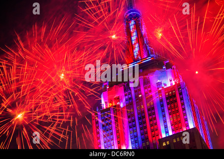 USA, New York, New York City, Empire state building with firework display Stock Photo