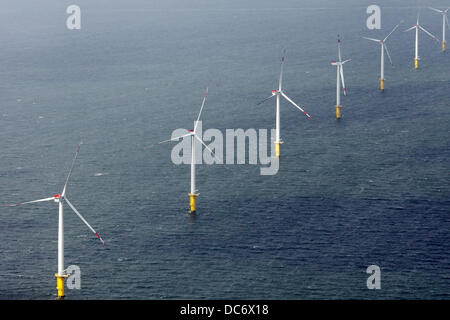 HANDOUT - A handout file dated 10 August 2013 shows wind turbines of the Offshore wind park Riffgat near Borkum, Germany. The wind park is not yet connected to the electricity grid and will deliver power in February 2014. Photo: MARKUS HIBBELER Stock Photo