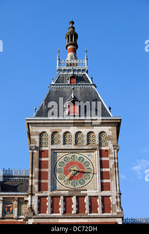 Clock tower of the Central Train Station in Amsterdam, Holland, Netherlands. Stock Photo