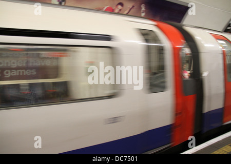 A tube train at Kings Cross St Pancras tube station in London, England. Stock Photo