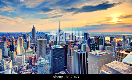 New York City skyline at dusk reflected in Hudson River, USA Stock ...