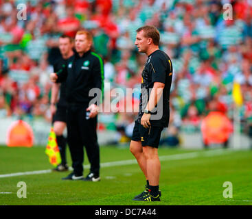 Dublin, Ireland. 10th Aug, 2013. Brendan Rodgers, Manager Liverpool looks on with Neil Lennon, Manager Celtic in the background during The Dublin Decider Football game between Liverpool FC and Glasgow Celtic from the Aviva Stadium. Credit:  Action Plus Sports/Alamy Live News Stock Photo