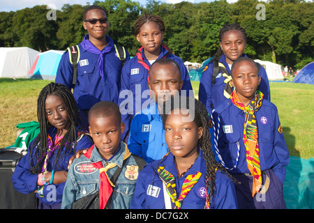 A group of scouts from Ghana, Africa, is having fun at the annual Cornwall Scout Jamboree at Pencarrow Stock Photo