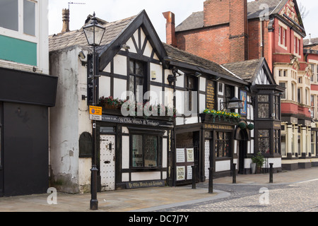 Ye Old Man and Scythe pub on Churchgate in Bolton, a pub first listed on this site in 1251, present building from 1636 in parts. Stock Photo