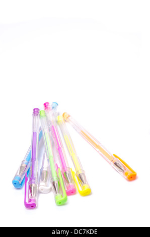 Close-up of colored fluorescent ball point pens on white background Stock Photo