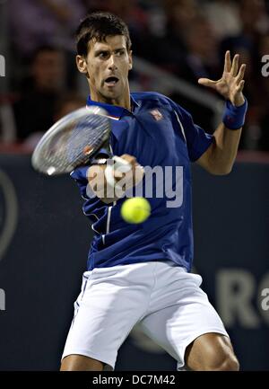 Toronto, Canada. 10th Aug, 2013. Rogers Canadian Open tennis championships. Novak Djokovic of Serbia Returns The Ball to Rafael Nadal of Spain during the mens Semi-finals Match AT The Rogers Cup in Montreal Credit:  Action Plus Sports/Alamy Live News Stock Photo