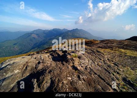 Western Ghats of South India Location Ponmudi at Trivandrum District Kerala Clouds and Hill top View Stock Photo