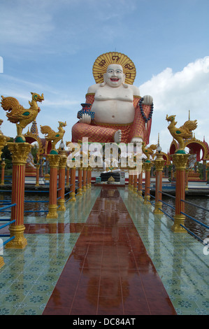 Laughing and Happy Big Buddha at Wat Plai Laem Ko Samui Stock Photo