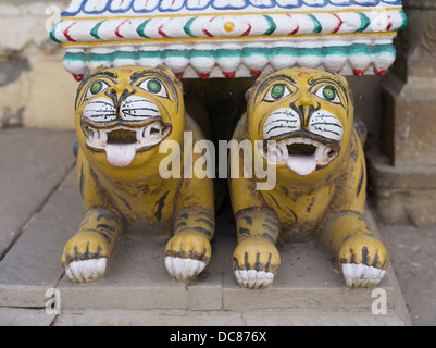 Tiger statues at Ramnagar Fort on the banks of the Ganges River - Varanasi, India Stock Photo