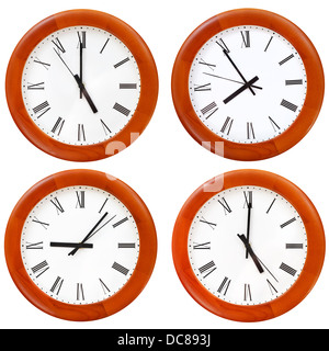 set of wooden round wall dial clock isolated on white background Stock Photo