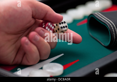 backgammon recreational game hand dice throwing Stock Photo