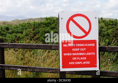 Sign warning people that they are entering a military firing range. Stock Photo