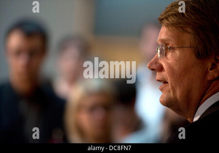 Chief of Staff of the German Chancellery and German Minister for Special Affairs, Ronald Pofalla (CDU), gives a press conference after a session of the Parliamentary Control Committee (PKG) at the Bundestag in Berlin, Germany, 12 August 2013. The members of parliament had asked Pofalla questions regarding the National Security Agency (NSA) and ist cooperation with the Dederal Intelligence Service (BND). Photo: RAINER JENSEN Stock Photo