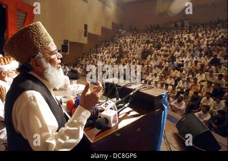 Jamat-e-Islami (JI) Ameer, Syed Munawar Hassan addresses to his supporters during Eid-Millan Party held at local hall in Peshawar on Monday, August 12, 2013. Stock Photo