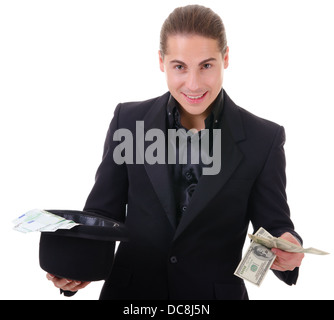 Paper money cash in dollars and euro from a hat holded by man in black suit. Isolated on white. Stock Photo