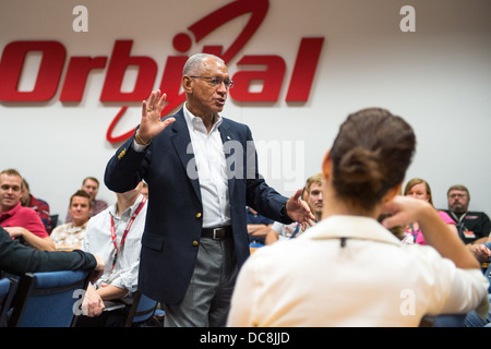 NASA Administrator Charles Bolden speaks with Orbital Sciences Corporation employees after touring the the Orbiting Carbon Observatory 2 satellite at Orbital's facility August 9, 2013 in Gilbert, AZ.