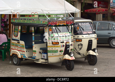 Nicely decorated mototaxis in Guatape, Colombia. Stock Photo