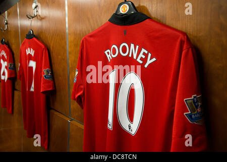 Wayne Rooney's Manchester United football shirt hanging in the old trafford home dressing room Stock Photo