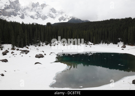The Carezza Lake in late winter, South Tyrol Stock Photo