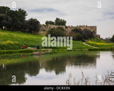 Israel. The ruins of an Ottoman fortress reflect in the Yarkon stream at the Afek park near Tel-Aviv Stock Photo