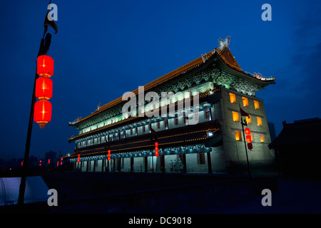 A building illuminated at night along the Lianhu Ancient City Wall; Xi'an, Shaanxi, China Stock Photo