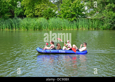 Young group with dog kayaking on River Thames, Pangbourne, Berkshire, England. United Kingdom Stock Photo