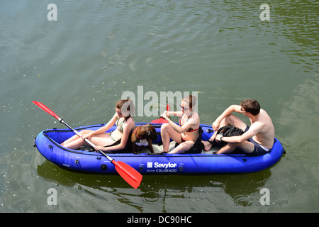 Young group with dog kayaking on River Thames, Pangbourne, Berkshire, England. United Kingdom Stock Photo