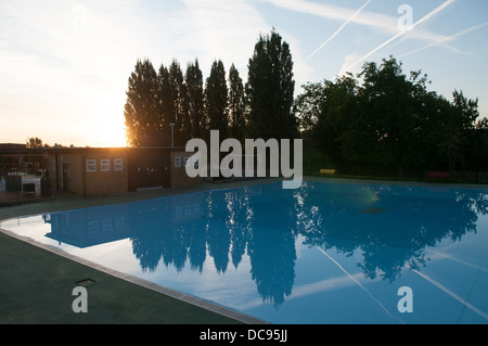 Sunrise on the swimming pool on Hampstead heath, London, England. Stock Photo