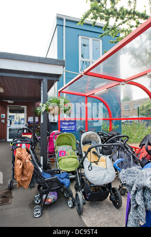 A buggy park at St. Pauls Nursery School and Children's Centre, Bristol UK Stock Photo