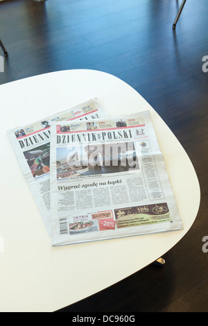 Two copies of Dziennik Polski. Polish newspapers on a table Stock Photo