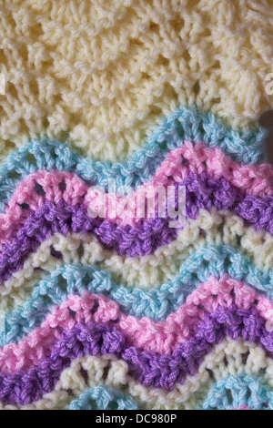 detail of colourful knitted baby jumper in pastel colours - abstract background Stock Photo