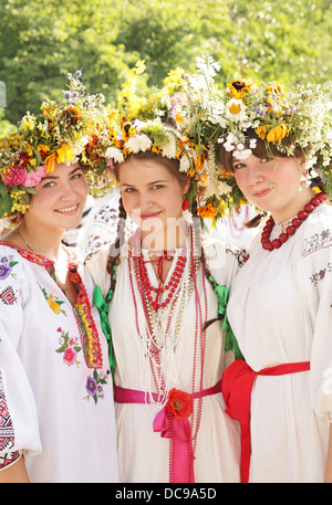 Young girls in ukrainian traditional national costumes, Ivan Kupala Day celebration, Kiev, Pirogovo, Pyrohiv, Ukraine Stock Photo