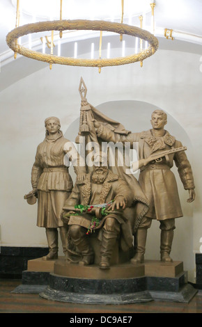 Bronze statues of partisans, Belorusskaya metro station Stock Photo