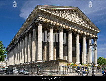 The Madeleine Church (Église de la Madeleine), as seen from the Madeleine plazza, in Paris (France). Stock Photo