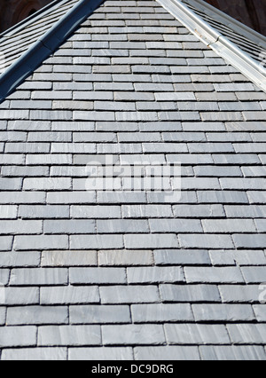 A rooftop covered with gray slate shingles Stock Photo