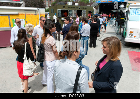 People line up at a mobile food vendor, Montreal. Stock Photo